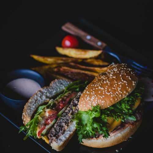 Savor this classic cheeseburger with fries, perfect for lunch or dinner.